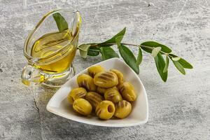 Grilled green olives appetizer snack photo