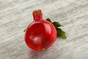 Ripe red sweet and juicy Pomegranate photo