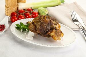 Baked Lamb shank with bone photo