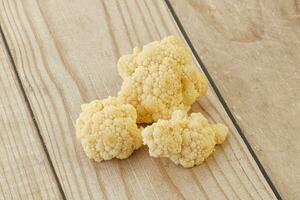 Raw white cauliflower cabbage heap photo