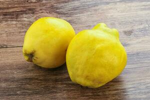 Fresh ripe yellow quince fruit photo