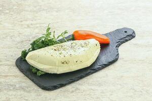 Raw haloumi cheese for grill photo