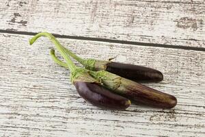 Baby organic purple eggplant heap photo