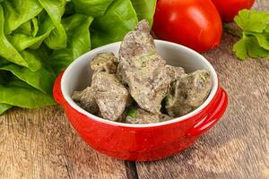 Chicken liver with cream sauce photo