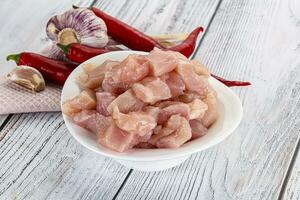 Raw uncooked chicken breast fillet photo