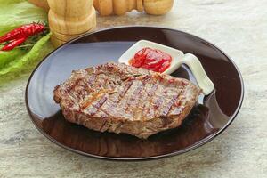 Grilled rib-eye steak beef meat photo