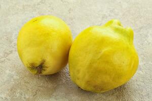 Fresh ripe yellow quince fruit photo