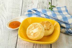 Baked cheesecakes with fruit jam photo