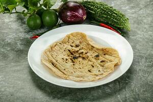 Indian traditional tandori bread - Roti photo