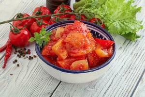 Hungarian lecho with tomato and paprika photo