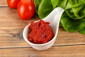 Tomato puree sauce for cooking photo