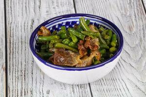 Roasted bacon with green bean photo