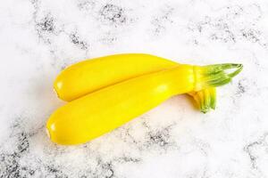 Yellow young zucchini for cooking photo