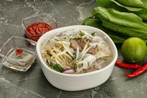 Vietnamese soup Pho Bo with beef photo