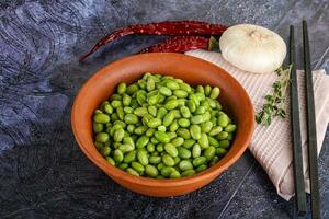 Bowl of delicious edamame beans photo