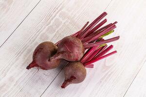 Young raw beetroot heap isolated photo