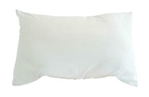 White pillow in hotel or resort room isolated on white background with clipping path photo