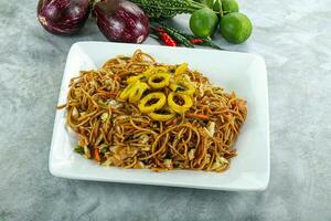 Stir fried noodles with squid photo