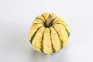 Ripe raw fresh decorative pumpkin photo