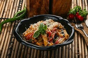 Vegetarian pasta penne with mushroom photo