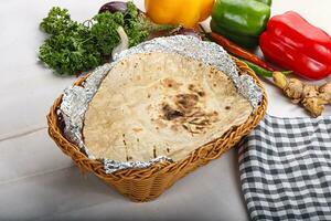 Indian tandoori bread in the basket photo