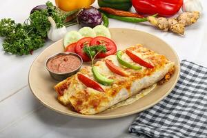 Mexican cuisine Enchiladas with meat photo