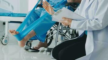 young asian physical therapist working with senior woman on walking with a walker video