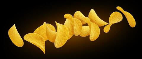 Falling potato chips isolated on black background photo