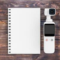 Pocket Handheld Gimbal Action Camera with Blank Note Pad. 3d Rendering photo