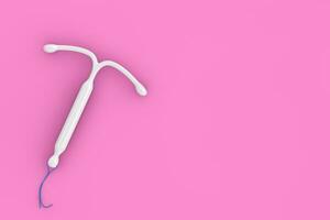 Birth Control Concept. T Shape IUD Hormonal Intrauterine Device. 3d Rendering photo