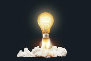 Creative light bulb rocket with blast and clouds takes off on a dark background, concept. Successful launch start up, creative idea. Think differently. Creative generator. Smart and thinking photo