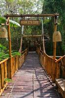 Malang, Indonesia - November 07 2023 - Bridge and park tourist attractions in Coban Lanang photo
