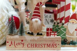 Close-up view of a wooden Christmas Santa Claus decoration. photo