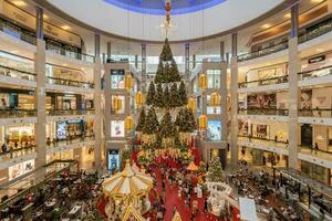 Beautiful Christmas decoration in Pavilion Kuala Lumpur. People can seen exploring and shopping around it. photo