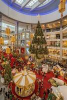 Beautiful Christmas decoration in Pavilion Kuala Lumpur. People can seen exploring and shopping around it. photo