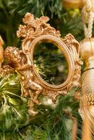 Close-up view of the Christmas ornaments hanging on the Christmas tree. photo