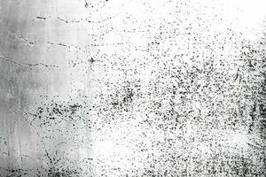 Grunge background of black and white. Abstract illustration texture of cracks, chips, dot. Dirty monochrome pattern of the old worn surface. photo