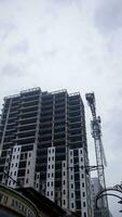 Depok, West Java, Indonesia - November 25, 2023, apartment building in the Depok area, when the weather is cloudy. photo