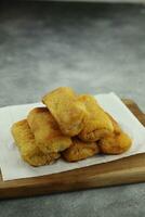 Risoles filled with meat and vegetables is one of popular appetizers in Indonesia deep fried. photo