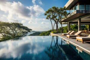 ai generado lujo villa con nadando piscina y mar ver a puesta de sol foto