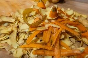 kitchen waste with potato and carrot peelings photo