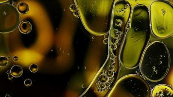 Abstract Colorful Food Oil Drops Bubbles and spheres Flowing on Water Surface photo