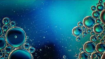 Abstract Colorful Food Oil Drops Bubbles and spheres Flowing on Water Surface photo