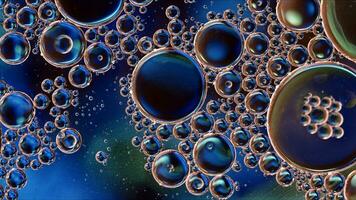 Abstract Colorful Food Oil Drops Bubbles and spheres Flowing on Water Surface photo