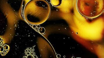 Abstract Colorful Food Oil Drops Bubbles and spheres Flowing on Water Surface photo