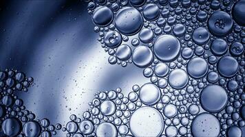 Abstract Colorful Food Oil Drops Bubbles and spheres Flowing on Water Surface photo