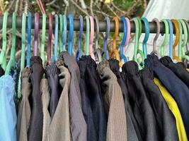 clothes hanging on a hanger in the garden photo