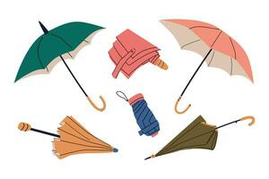 Closed, open, folded umbrellas in different colors vector