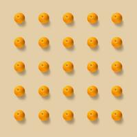 Fruit pattern of fresh oranges on yellow background. Pop art design, creative summer concept. photo