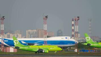 NOVOSIBIRSK, RUSSIAN FEDERATION JUNE 17, 2020 Side view, commercial plane Embraer E170, VQ BYK of S7 Airlines taxiing at Tolmachevo Airport, Novosibirsk video